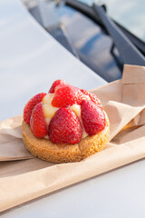 Strawberry shortcrust pastry cake with custard close-up