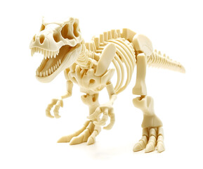 Dinosaur plastic toy skeleton, bones made of beige plastic