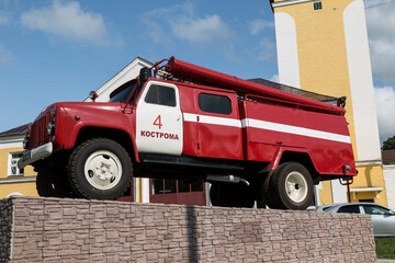 Fire engine on a pedestal - a monument to firefighters. Kostroma, Russia