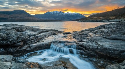 Obraz premium Breathtaking Sunset Over Mountain Lake Landscape