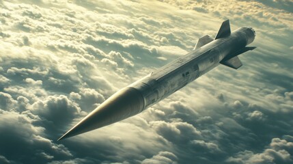 Fototapeta premium Tactical missile with pointed warhead, showcasing advanced engineering, on a cloudy background