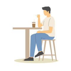 Man Sitting at a Table with a Drink and a Straw