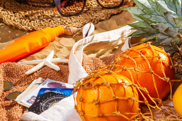 Egypt beach holiday concept with money, fruits and accessories, close-up, selective focus