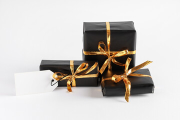 Black gift boxes on white background
