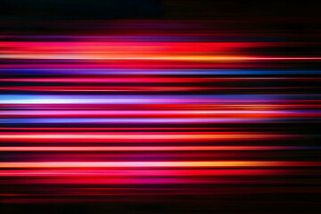 The effect of red light in fast motion on a black background. blurred abstract background with long exposure. neon light