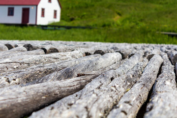 Rustic Wooden Texture With Farmhouse in Background