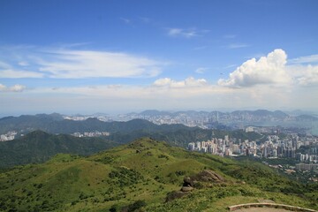 Fototapeta premium Scenic Cityscape View from Mountain Peak on a Clear Day, Tai Mo Shan, Hong Kong
