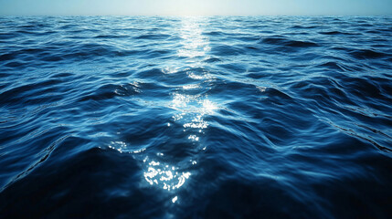 Obraz premium Calm ocean surface reflecting sunlight at dawn