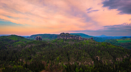 Aerial view on rock formation "Schrammsteine" of Saxon Switzerland during sunset