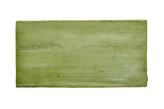 A textured green paint block with slightly rough edges isolated on white background