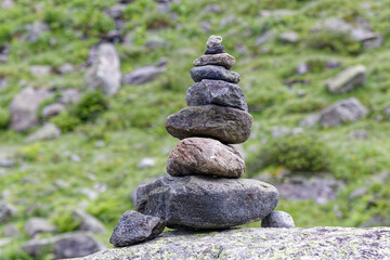 Closeup of a stone pyramid in the mountains, Alps, Europe