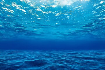 Water blue background / abstract blue background / underwater rays of the sun