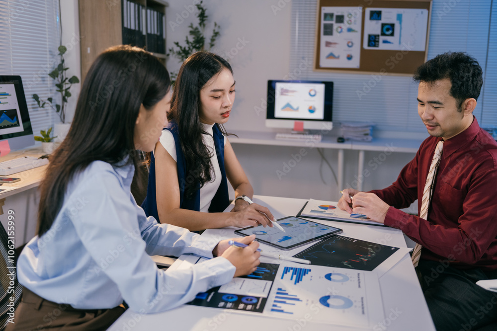 Poster asian business team working together on a project using paperwork and digital tablet with charts and