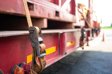 Close-up at locking device of safety latching strap that using for secure equipment or heavy object...