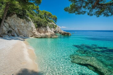 Fototapeta premium Crystal clear water washes onto beach