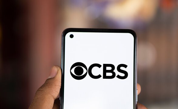 Dhaka, Bangladesh- 03 Nov 2024: CBS logo is displayed on smartphone.
