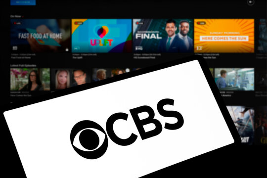 Dhaka, Bangladesh- 03 Nov 2024: CBS logo is displayed on smartphone.