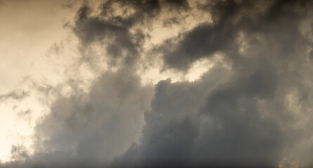 Dark clouds against a light sky.On the eve of bad weather. Waiting for the rain.Clouds in the sky.