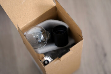 The paper box in which the light bulbs are placed.