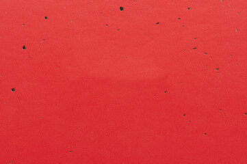 Textured red cardboard card