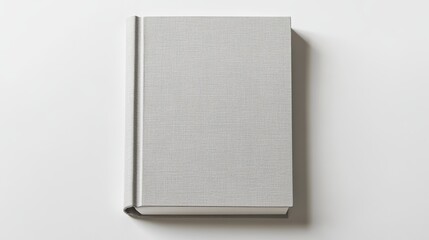 Top View of Blank Hardcover Book on White Background