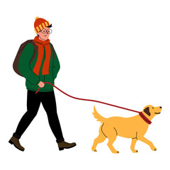 A person walking a golden retriever dog on a sunny day in a suburban area wearing warm clothing