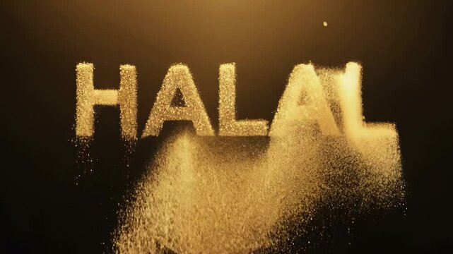 The image is a close up of the word "halal" written in gold letters. The word is surrounded by a cloud of dust, giving it a mystical and ethereal appearance. The use of gold