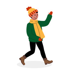 Cheerful child walking in winter attire with a warm hat and scarf against a white background