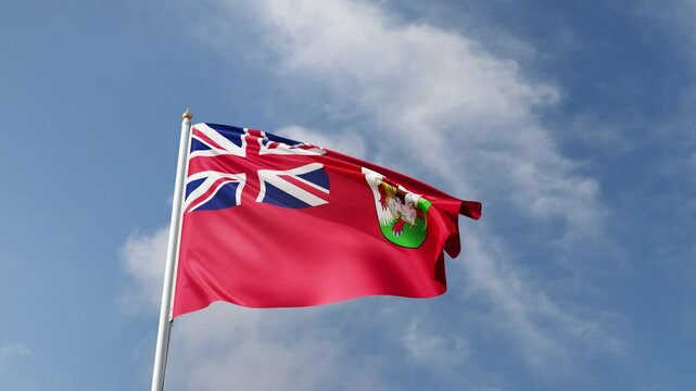 Flag of Bermuda on a blue sky, flag on a flag pole waving in the wind, country in north america, national symbol of Bermuda, video of a flag