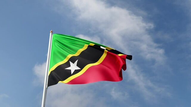 Flag of Saint Kitt and Nevis on a blue sky, flag on a flag pole waving in the wind, country in north america, national symbol of Saint Kitt and Nevis, video of a flag