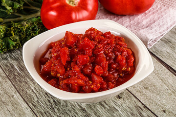 Diced ripe tomato with sauce