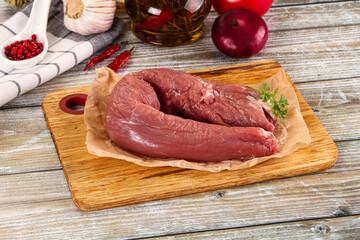 Raw pork tenderloin for cooking