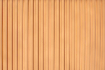 orange striped wall with vertical lines in a modern interior design setting