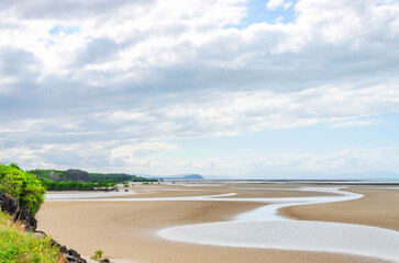 Outstanding view from Yule Point on Coral See sandy coastline in Queensland, Australia. It is situated 10 km south of Port Douglas.