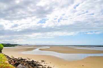 Outstanding view from Yule Point on Coral See sandy coastline in Queensland, Australia. It is situated 10 km south of Port Douglas.
