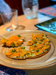 This delicious Asianinspired dish has vibrant toppings, ideal for sharing with friends