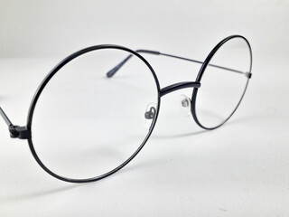Round shaped and thin framed glasses isolated on white background