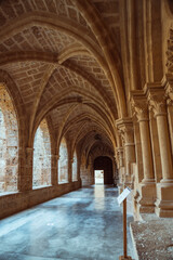 Serene Stone Archways of an Ancient Monastery Corridor