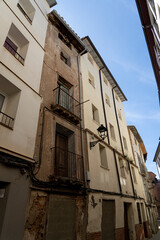 Naklejka premium Antique Balcony on Distressed Urban Building