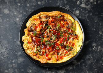 Foo Young Chinese egg omelette filled with vegetables, mushrooms, shrimp and sauce