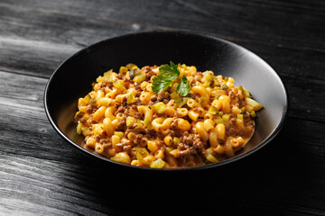 Cheeseburger Pasta with beef, melted cheese, gherkins and pasta