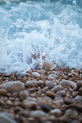 sea wave rolling on the rocks