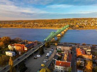 Aerial view of the Vistula river and the bridge in Wloclawek in Poland, autumn scenery.