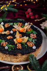 Napoleon cake on a fir background. Christmas cake. Napoleon cake for Christmas dinner