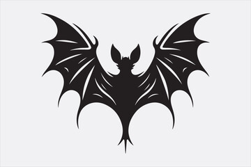 A black silhouette of a flying bat with outstretched wings.