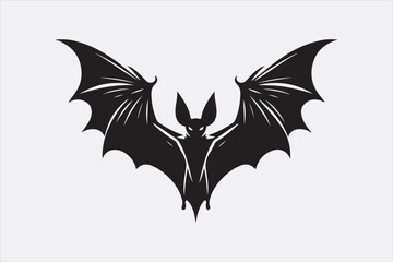 A black silhouette of a flying bat with outstretched wings.