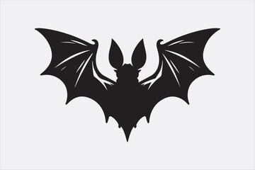 A black silhouette of a flying bat with outstretched wings.