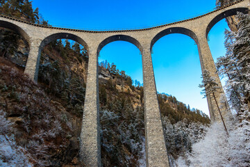 View of Landwasser Viaduct, Rhaetian railway, Graubunden in Switzerland at winter