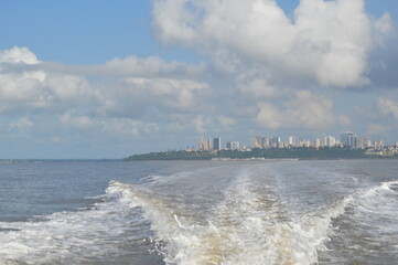 Obraz premium Maputo city skyline , sky line view from a distance on a boat trip to Portuguese Island
