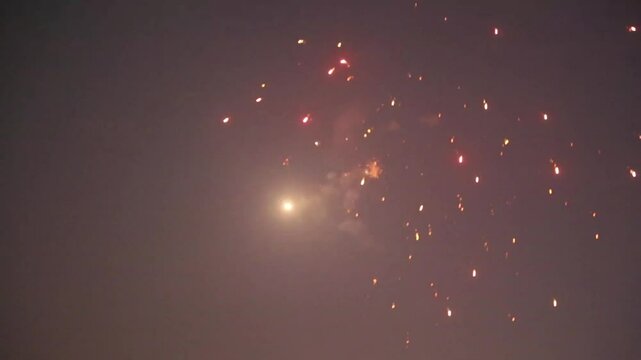 Real Fireworks Explosion on Smoke Foggy black Motion Background loop Sky on Fireworks Explosion. Diwali Fireworks for wedding, abstract, celebration, independence day and new year background